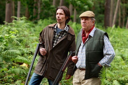 One-time Home Farm gamekeeper Will Grundy (Philip Molloy) with farmer Brian Aldridge (Charles Collingwood).