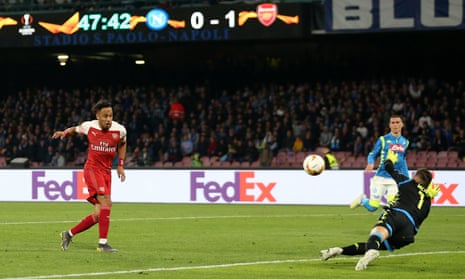 Arsenal’s Pierre-Emerick Aubameyang has his shot saved by Napoli goalkeeper Alex Meret.