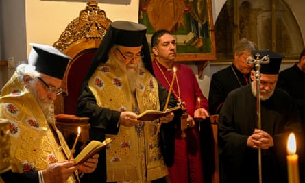 The ceremony taking place in the Church of the Holy Sepulchre in Jerusalem