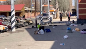 A general view shows personal belongings of victims and burnt-out vehicles after a rocket attack on the railway station in the eastern city of Kramatorsk.