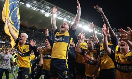 Central Coast Mariners celebrate their 6-1 demolition of Melbourne City in the A-League Men's Grand Final.