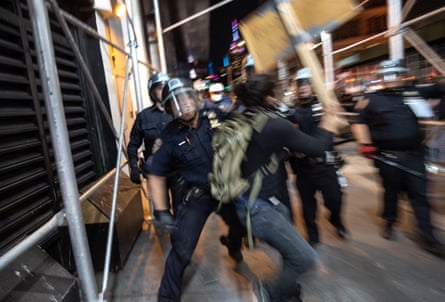 Protesters clash with New York City police during a march in Manhattan on 31 May.