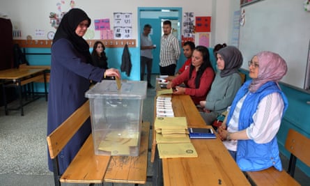 A woman casts her vote in Corum, Turkey, on Sunday
