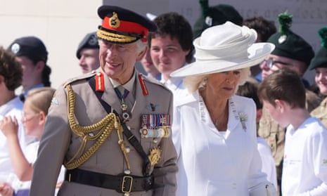 King Charles and Queen Camilla arrive.