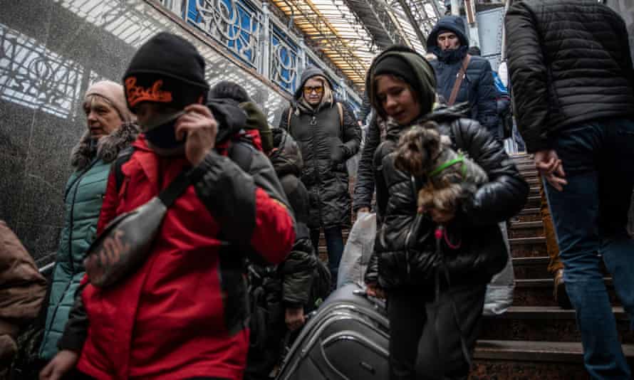 Refugees arriving at the Lviv train stations from cities across the country