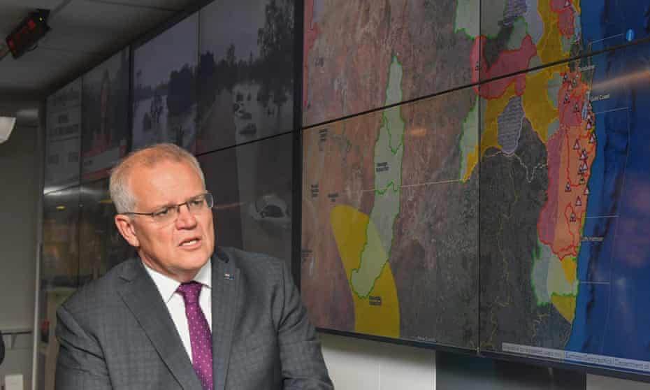 Prime minister Scott Morrison is briefed on Australia’s flooding disaster