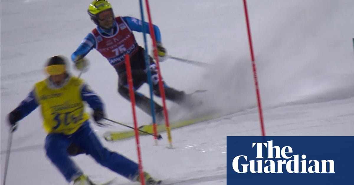World Cup slalom skier interrupted by course worker on slopes – video