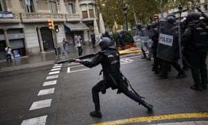 Spanish riot police in Barcelona on Sunday