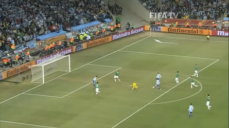 Carlos Tevez, furthest to the left, is about to put Argentina 1-0 up.