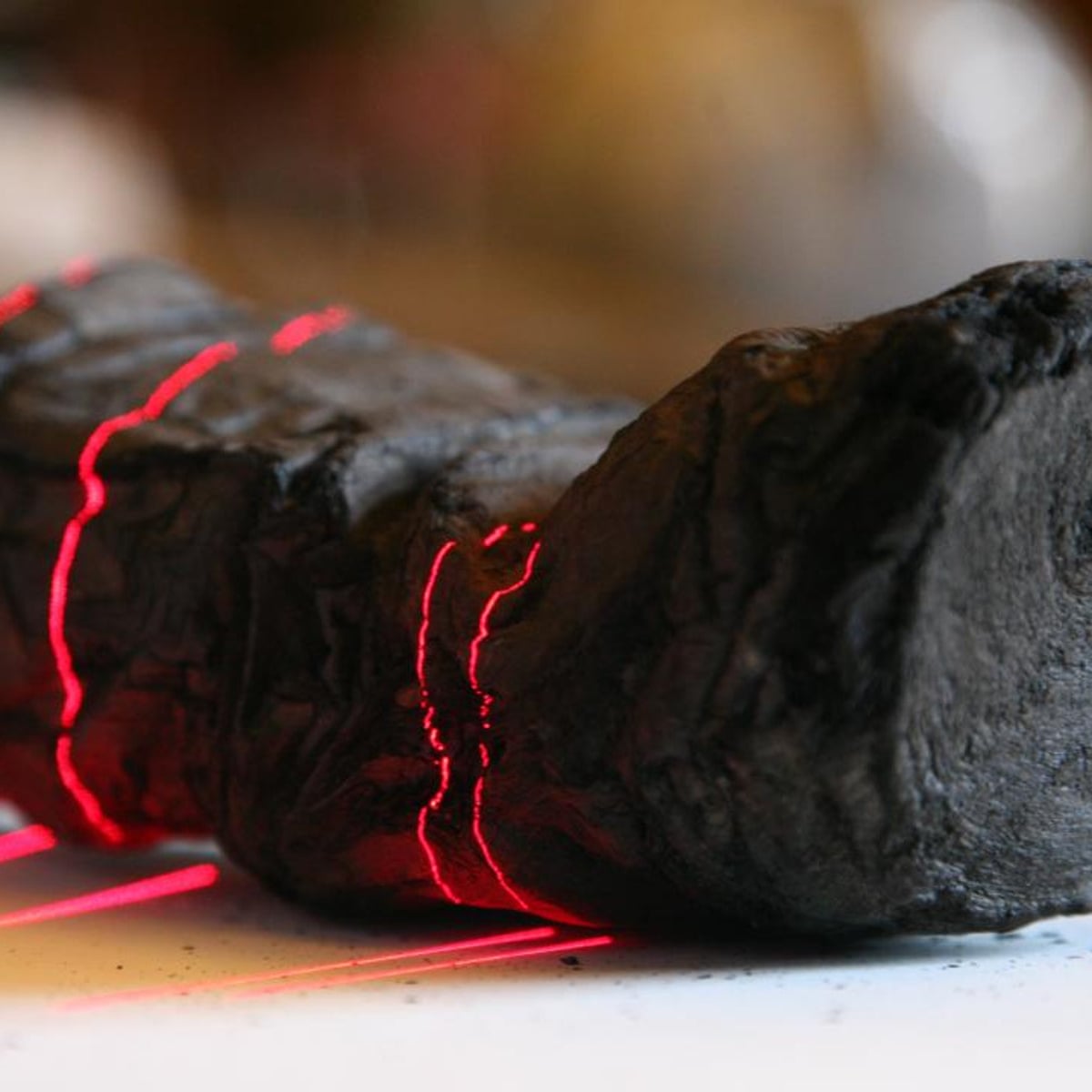 Researchers use AI to read word on ancient scroll burned by Vesuvius | Science | The Guardian