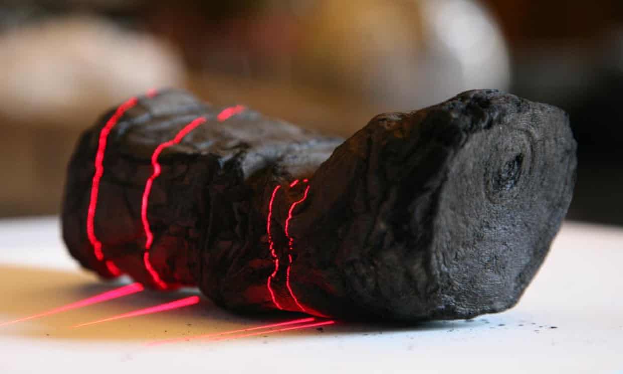Researchers use AI to read word on ancient scroll burned by Vesuvius (theguardian.com)