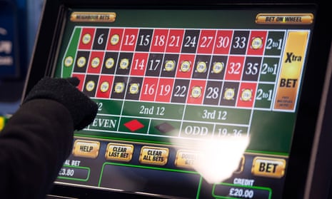 Someone using a gambling machine