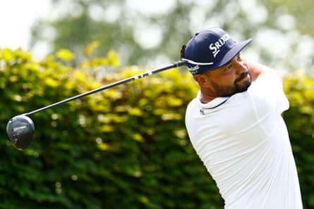 JJ Spaun tees off from the ninth hole