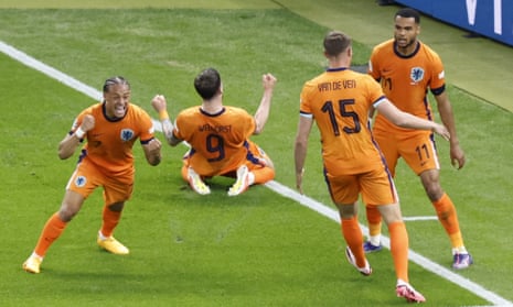 Dutch players celebrate with Cody Gakpo after Mert Muldur’s own goal under pressure from the forward.