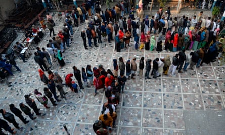 People queue at a polling station. With 900 million voters, the scale of India’s general elections is staggering, but the proposed vaccination programme will dwarf even those numbers.