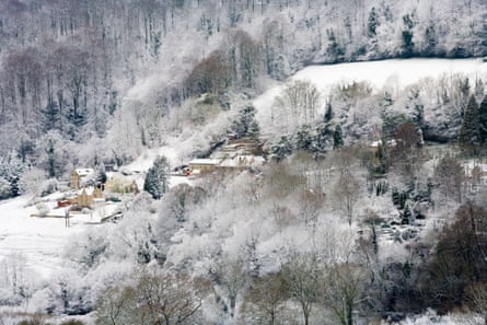 Snow on the Cotswold village of Slad (7.8). Photograph: Cotswolds Photo Library/Alamy
