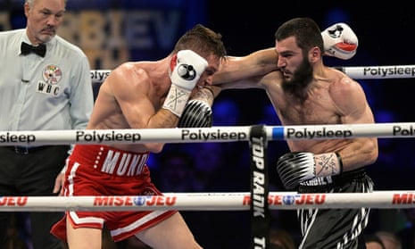 Artur Beterbiev tears down Britain's Callum Smith in seven to retain titles  | Boxing | The Guardian