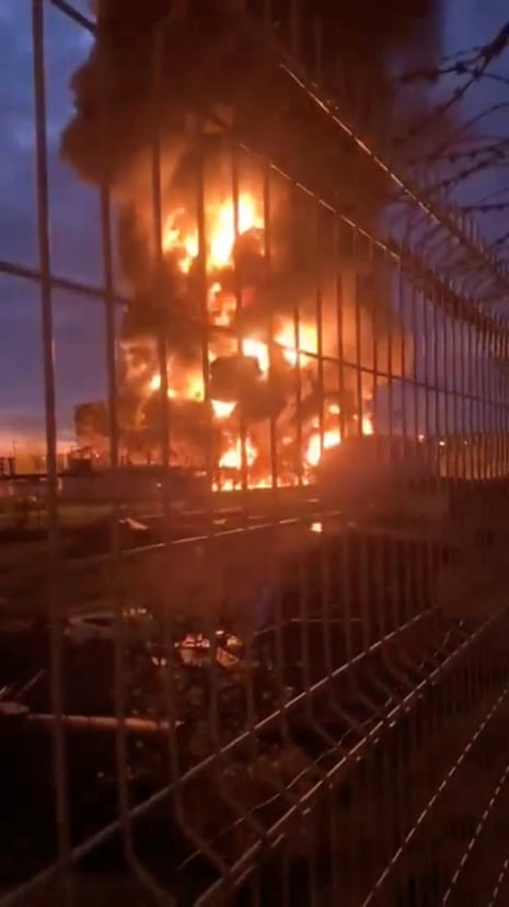 A still image from a video shared on social media that reportedly shows a large fire after Ukrainian drone attacks on Russia’s Smolensk oil depot.
