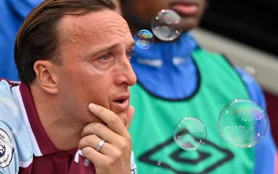 West Ham’s Mark Noble gets emotional on the subs bench before the fixture against Manchester City, his final home game for the Hammers. The match ended 2-2.