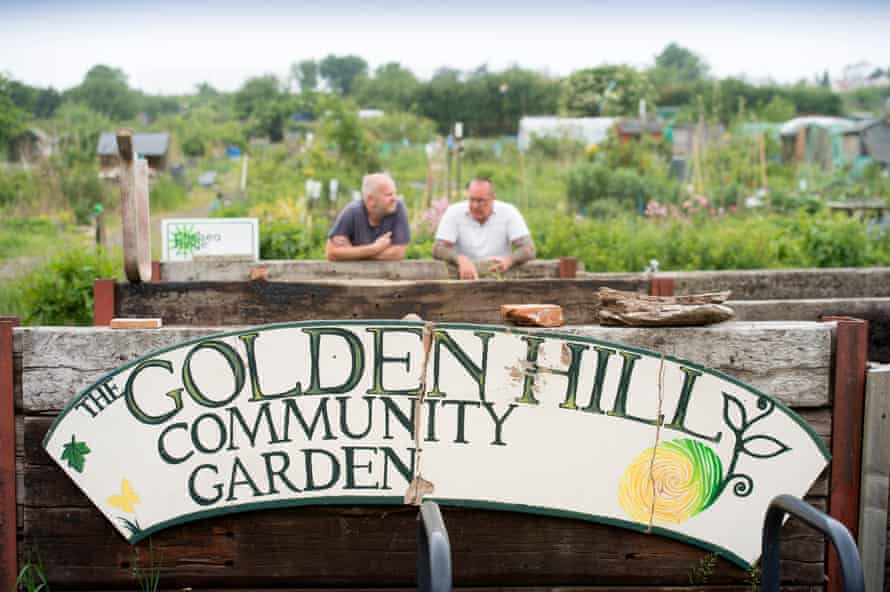 Gardeners chatting at the Golden Hill community garden in Bristol