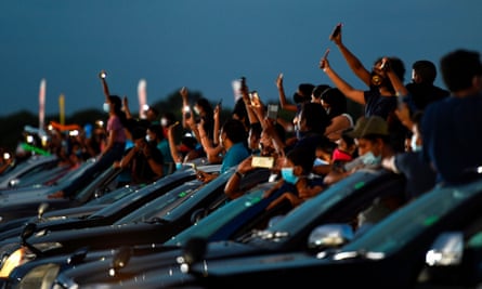Lovebox to glovebox: Concertgoers attend a drive-in show at an an airport in Colombo, Sri Lanka