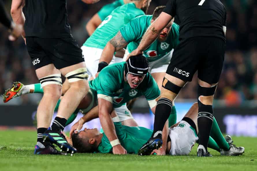 Johnny Sexton of Ireland lies on the ground injured.