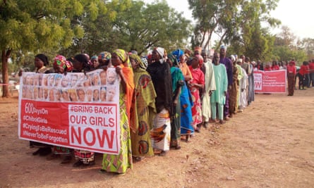Members of the Bring Back Our Girls movement and mothers of the missing schoolgirls march in Abuja.