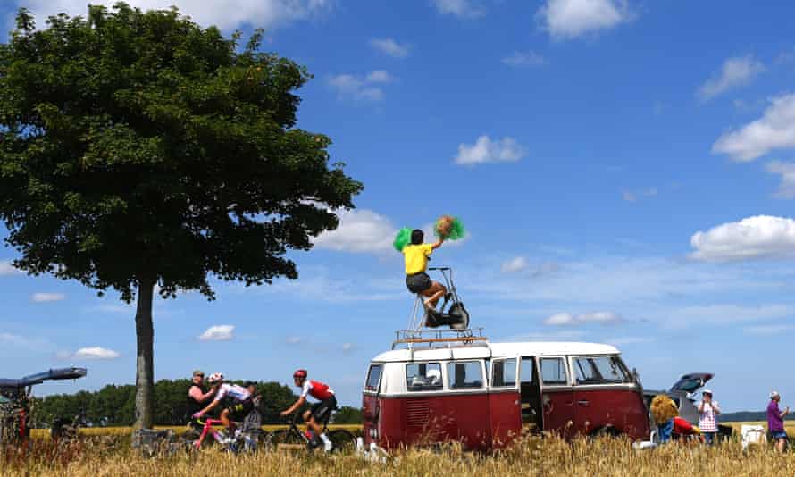 (L-R) Magnus Cort Nielsen of Denmark and Team EF Education - Easypost Polka Dot Mountain Jersey and Anthony Perez of France and Team Cofidis compete in the breakaway while fans cheer