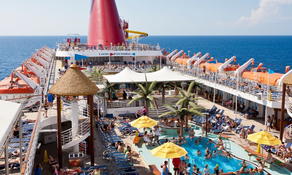 Cruise passengers enjoying the sun on deck.
