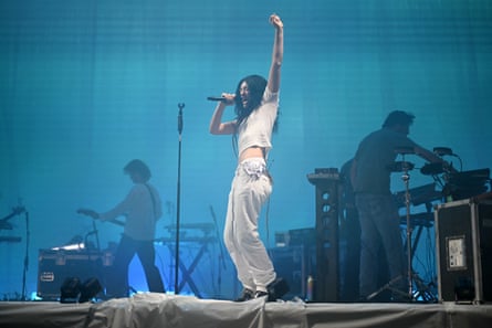 Lorde singing on a stage at Glastonbury