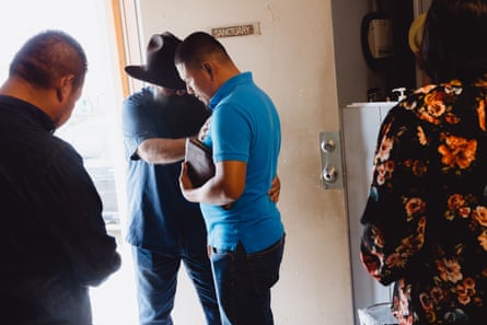 Pastor Jorge Tovar greets congregants during a Sunday service at Jordan River church in Laredo.