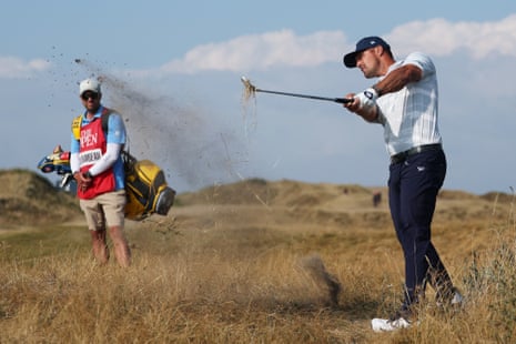 DeChambeau powers out of the rough on the 11th.