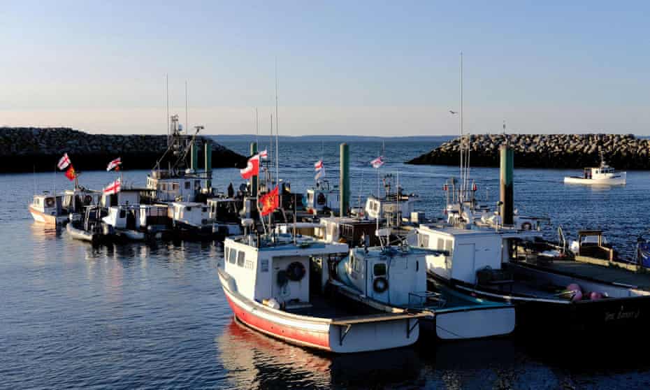 Fishermen from the Sipekne’katik band work from a wharf after opposition from non-Indigenous fishers in Saulnierville, Nova Scotia.