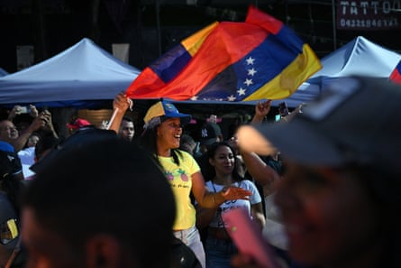 A supporter of Venezuelan opposition presidential candidate Edmundo González Urrutia and opposition leader Maria Corina Machado attends a rally demanding the closure of polling stations during the presidential election in Caracas on Sunday.