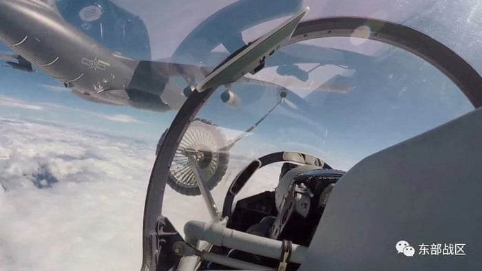 An Air Force aircraft under the Eastern Theatre Command of China’s People’s Liberation Army (PLA) gets refuelled mid-air during military exercises in the waters around Taiwan, in this screengrab from a 4 August, 2022 video that was released on 5 August.