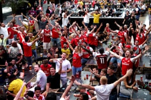 The Gooners at Box Park Wembley celebrate after Pierre-Emerick Aubameyang scores his side’s equaliser.
