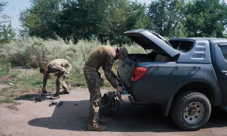 Oleksandr and Petro collect an FPV drone.
