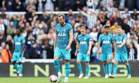 Harry Kane walks back to the halfway line in a dejected manner