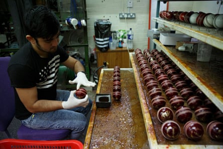 Polishing balls at the factory in Walthamstow.