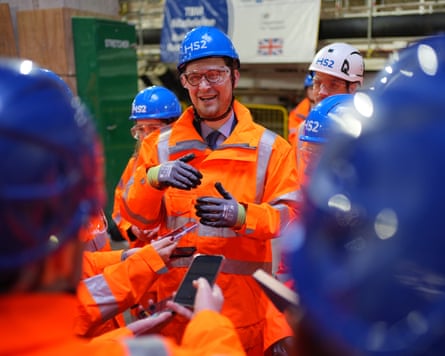 Jones and others in orange hi-vis with blue helmets
