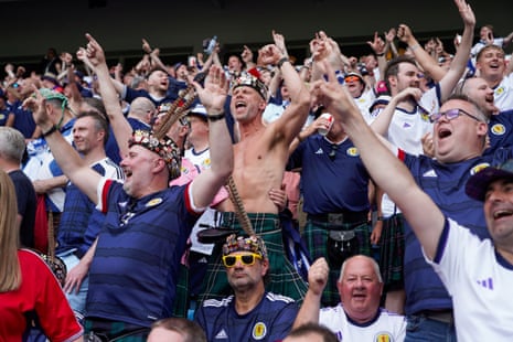 Scotland supporters cheer before the Euro 2024 qualifier against Norway in Oslo.