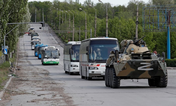 Buses leave Mariupol carrying Ukrainian forces who have surrendered after weeks holed up at the Azovstal steelworks, under escort by pro-Russia forces.