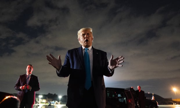 Trump at Andrews air force base on Thursday night after a campaign rally in Pennsylvania. He said the report was ‘a total lie’.