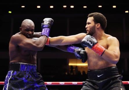 Moses Itauma punches Dillian Whyte during their heavyweight fight last August.