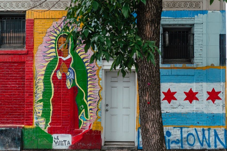 A colourful wall painted with murals in Little Village, Chicago.