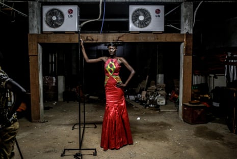 Model Amy Faye waits backstage during Dakar fashion week, June 2016