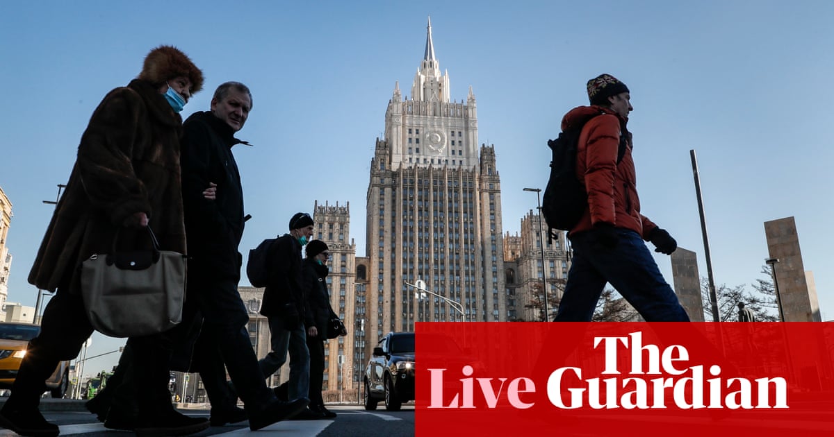 Russian bond default ‘imminent’, warns Fitch, as more companies suspend operations – business live