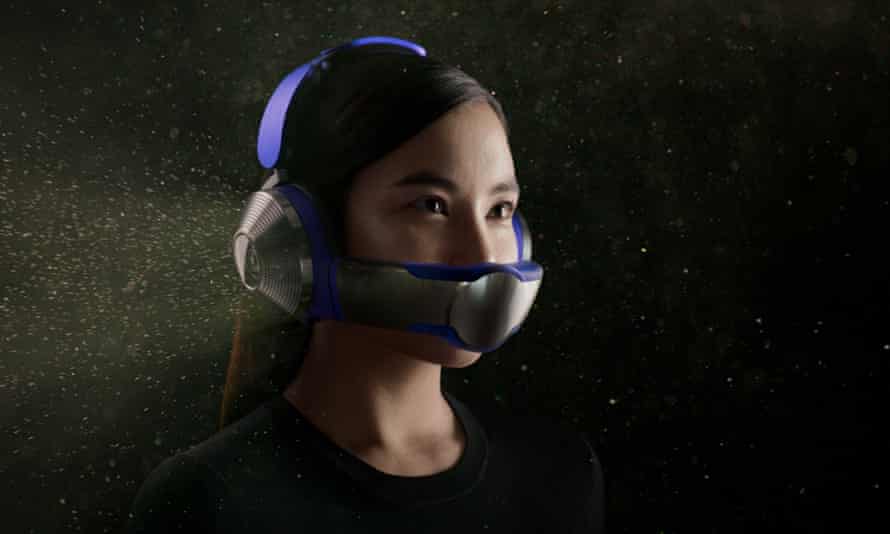 a woman wearing the Dyson Zone headphones and visor