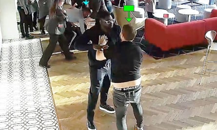 A screengrab taken from CCTV footage at the Emirates shows Micah Richards grappling with Scott Law (right).