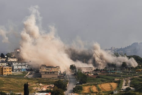 Massive cloud of smoke above a city after an airstrike.